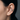 Side view of piercing-free serpent cuff earring worn on ear cartilage showing intricate gold vermeil snake details