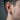 Men's beaded hoop earring worn on the ear, demonstrating the thick architectural profile and secure hinged closure.