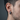 Side profile view of handcrafted gothic cross earring worn by a model showcasing its thick band and precise fit