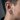 Minimalist grooved hoop earring worn on male ear showcasing modern architectural design and comfortable fit