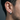 Model wearing the modern men's silver hoop earring showing the comfortable fit and subtle rivet details