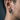 Ribcage Skull Hoop Earring, product photo worn on ear