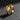 Angled view of the gold-plated version of the Silver Lantern Ring, highlighting the band's carved lines and bold shape.