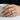 Bushido Signet Ring, worn on model hand holding a cup