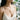 Japanese chopsticks pendant worn on model, neck view