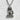 Close-up of the handcrafted sterling silver Okinawan shisa pendant highlighting the deep oxidized mane and facial details