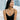 Hammered Happiness Kanji Pendant worn on model neck with black dress