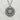 Close-up of oxidized silver cherry blossom pendant showing intricate Japanese manhole cover detailing