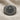 Hittite Seal Ring, oxidized silver, front view on fabric
