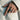 Man wearing solid sterling silver Masonic ring on finger, showcased against beige linen blazer