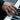Scottish Rite Eagle Ring, worn on model hand at piano keys