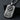 Masonic Dog Tag Pendant, oxidized, angled view on dark stone display