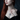 Woman modeling the handcrafted 925 sterling silver Sigil of Lucifer pendant necklace with a black velvet dress