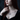 Gothic oxidized silver Sigil of Lilith pendant with crescent moons worn elegantly by a red-haired woman on a silver chain