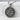 Close-up of the handcrafted oxidized silver Celtic raven pendant highlighting the textured feathers and woven edges