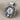 Rose Initial Pendant, oxidized silver, angled studio photo