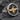 Winged bull faravahar signet ring, oxidized two-tone finish, front view on stone
