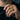 Gott Mit Uns Ring, gold vermeil, worn on model hand holding sunglasses