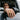 Man wearing gold Force Recon military signet ring resting hand on car window with legacy product text overlay