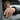 Close-up of man wearing oxidized silver Saint Christopher signet ring resting hand on car window