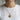 Model wearing a handcrafted sea turtle pendant necklace showing fit and chain length on white t-shirt