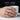 Lifestyle view of the handcrafted Semper Fidelis ring worn on a man's hand while playing a keyboard instrument