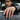 War Signet Ring, oxidized silver, worn on model hand resting on car window