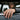 Lifestyle view of a man wearing the oxidized silver Puddin letter ring while leaning out of a car window