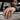 Man wearing the oxidized silver bearded skull ring on index finger in a lifestyle setting resting on car door