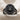 Spider Cameo Ring, black rhodium, front view on woven linen