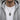 Man wearing the handcrafted 925 sterling silver sacred heart pendant necklace over a grey zip hoodie