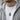 Man wearing oxidized silver Buddha dragon necklace over casual white shirt and grey hoodie for daily wear