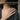 Handcrafted silver bone and branch ring worn on finger showcasing delicate stacking fit and dark cottagecore style