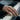 Baroque Ornament Ring in gold vermeil, worn on model's hand at a piano