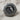 Capricorn Skull Ring, oxidized silver, high angle view on linen