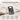 Oxidized silver skull ring resting on linen displaying solid 925 sterling silver craftsmanship callouts