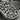 Catacomb Skull Dog Tag Pendant, oxidized, close-up of skull relief