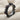 Garnet Rose Eternity Ring in black rhodium plated finish
