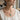 Model wearing the turquoise bird pendant necklace with gold accent finish and round genuine turquoise stone