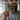 Bearded man holding the silver Yggdrasil tree of life beard comb for grooming daily beard care representation
