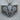 Layered Elephant Pendant in oxidized silver, front view on wood block