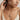 Ribbon cross pendant, worn on model, neck view