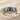 Blue Sapphire Dove Promise Ring, oxidized silver, front angled view