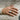 Fluted Cushion Signet Ring, oxidized silver, worn on model's hand