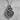 Celtic Heart Knot Crest Pendant in oxidized silver, angled studio view