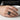 Griffin Swept Tail Ring, black rhodium, worn on model hand
