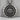 Aztec Sun Stone Relief Pendant, oxidized silver, angled studio view