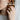 Tiger Eye Shell Volute Ring, oxidized silver, worn on model hand