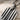 Broken Flute Pendant, oxidized silver, close-up view of grooved texture