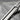 Stepped Rail Tie Clip Accessory, oxidized, close-up of stepped rail and channel